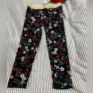 2 pairs of Carters leggings pants. Holiday print. Size Toddler 2T. NWT.